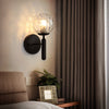 Modern Wall Sconce with Domed Glass Cover in Brass or Black Finish