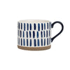 White Ceramic Coffee Cup with Blue Modern Designs